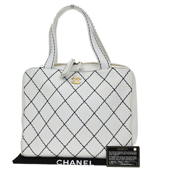 Chanel Handbags - Chanel Surpique Zip Around Satchel Quilted Leather White Leather Handbag